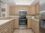 Kitchen with New Stainless Steel Appliances at 1824 Beachside Tennis